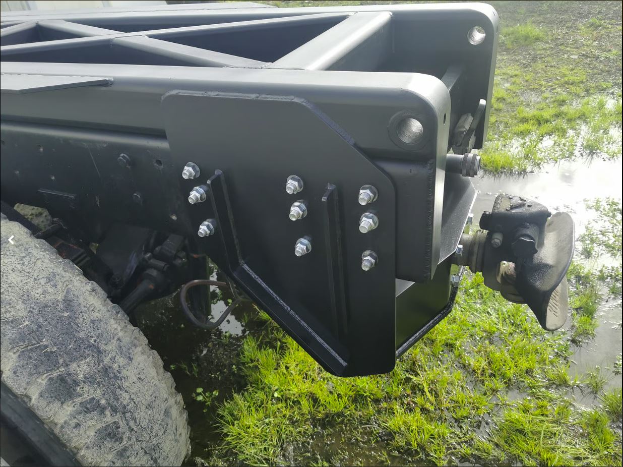 Custom heavy steel drawbar bracket fabricated by Cole Engineering