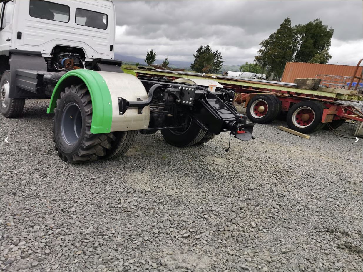 Custom mudguard and tag axle fit-up by Cole Engineering