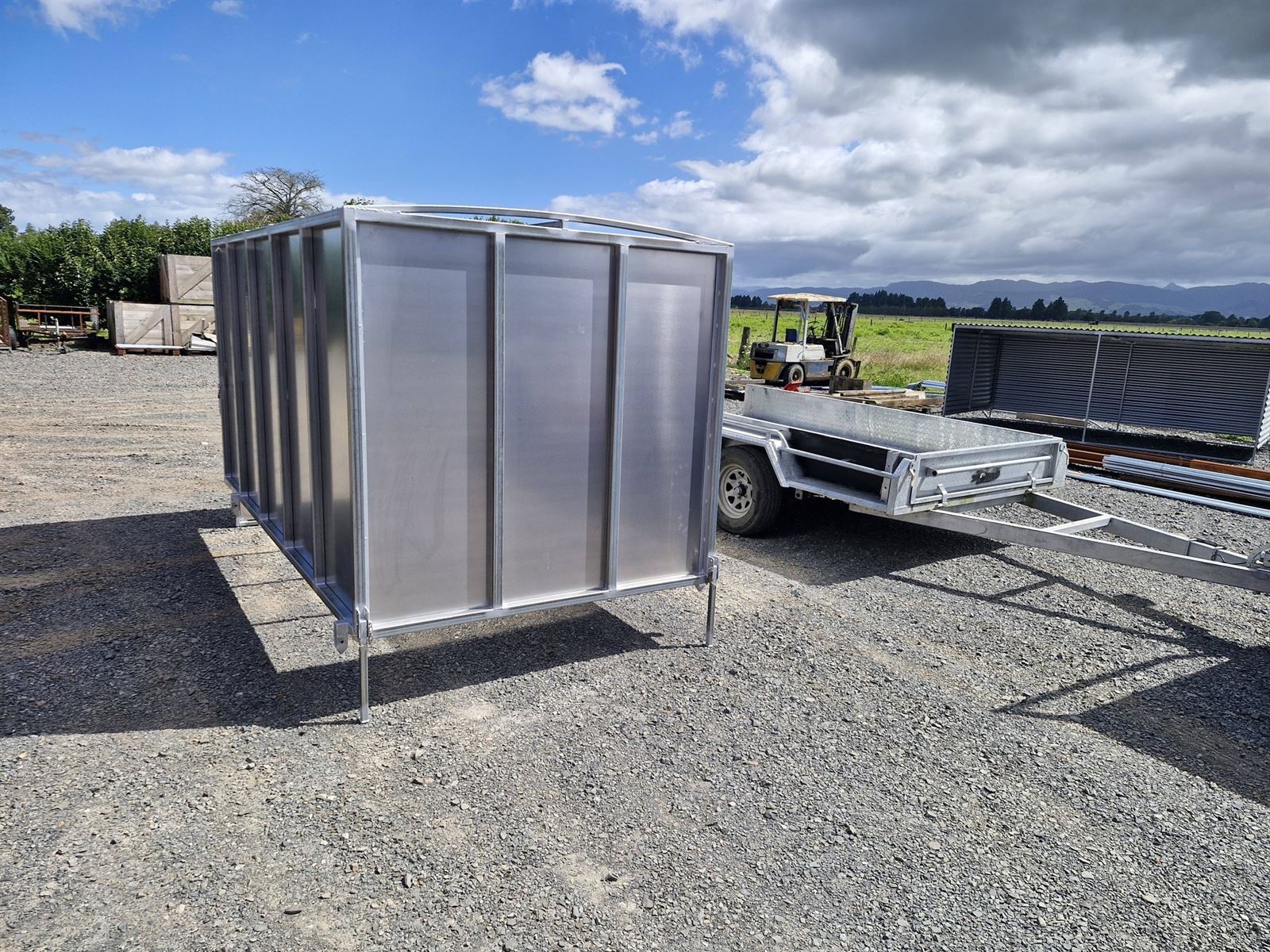 Stock crate trailer front three-quarter at yard